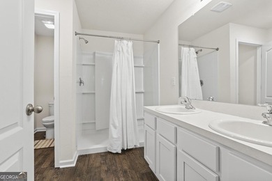 Welcome to Bartram Place! This 3-bedroom, 2-bath home offers a - photo 23