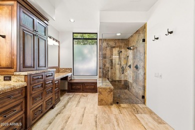 Tucked into a private Desert Mountain setting, this - photo 24