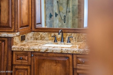 Tucked into a private Desert Mountain setting, this - photo 28