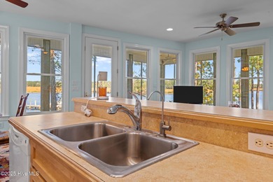 Welcome to this inviting waterfront retreat located in the - photo 8