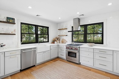 Tucked within a private waterfront enclave on a beautiful - photo 5