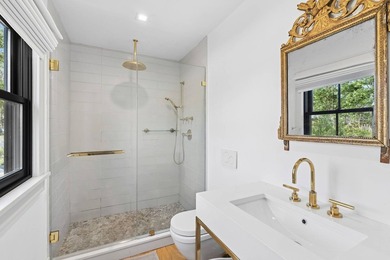 Tucked within a private waterfront enclave on a beautiful - photo 9