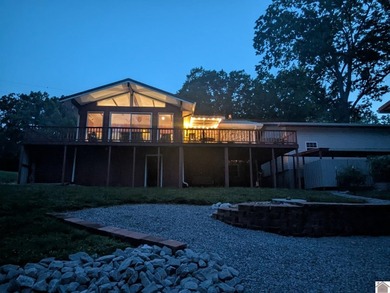Enjoy year-round views of Lake Barkley from both the front and - photo 1