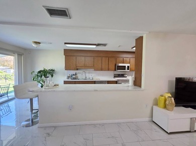 LAKE OKEECHOBEE ACCESS - Exceptional brick home situated on a - photo 12