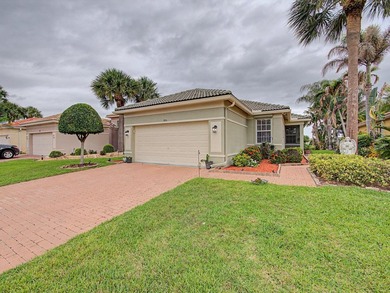 Welcome to this immaculate, lovingly maintained lakefront home - photo 1