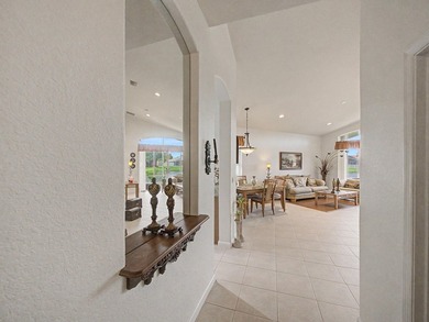 Welcome to this immaculate, lovingly maintained lakefront home - photo 2