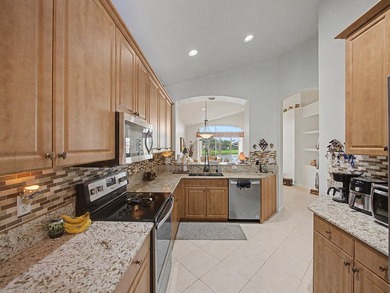 Welcome to this immaculate, lovingly maintained lakefront home - photo 3