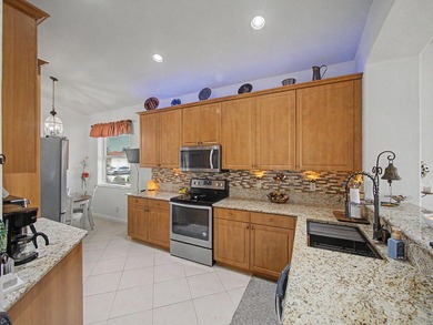 Welcome to this immaculate, lovingly maintained lakefront home - photo 4