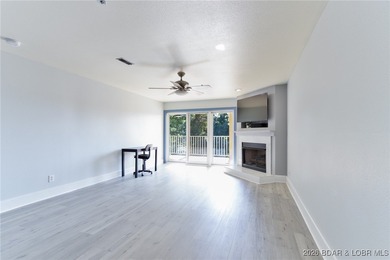 This inviting 3-bed, 2-bath main-level condo sits in The Ledges - photo 14