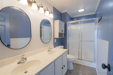 This inviting 3-bed, 2-bath main-level condo sits in The Ledges - photo 16