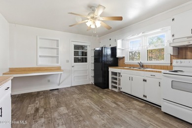 Situated on a rare full acre with no HOA, this cute brick home - photo 16