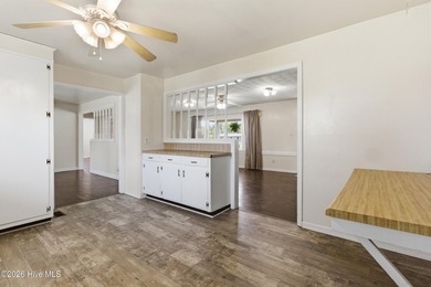 Situated on a rare full acre with no HOA, this cute brick home - photo 17