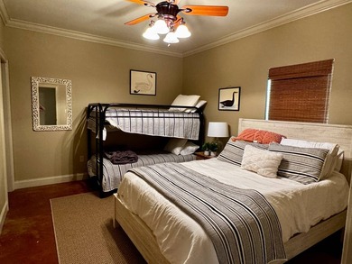 This exquisite four-bedroom camp, complemented by an attached - photo 21