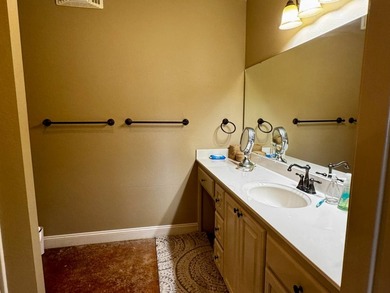 This exquisite four-bedroom camp, complemented by an attached - photo 23