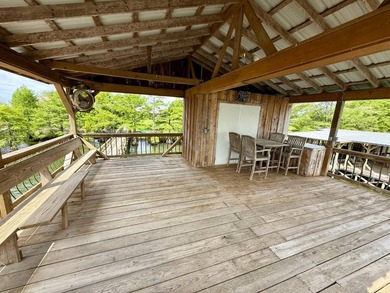 This exquisite four-bedroom camp, complemented by an attached - photo 35