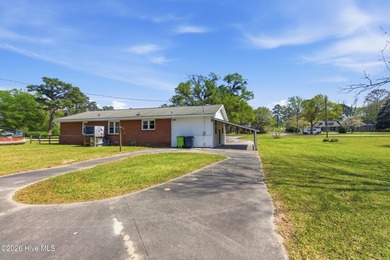 Situated on a rare full acre with no HOA, this cute brick home - photo 36