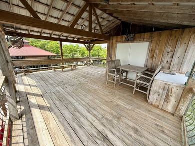 This exquisite four-bedroom camp, complemented by an attached - photo 37