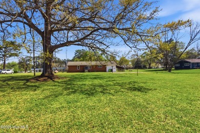 Situated on a rare full acre with no HOA, this cute brick home - photo 39