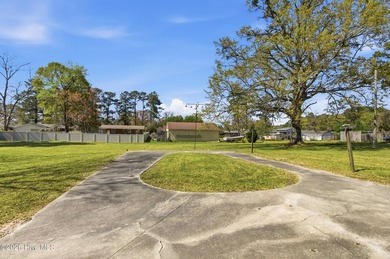 Situated on a rare full acre with no HOA, this cute brick home - photo 40