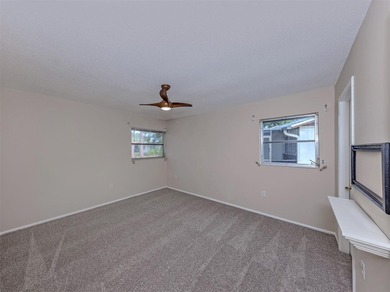 This beautifully maintained two-bedroom, two-bath villa offers - photo 22