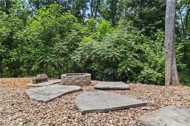 Experience exceptional lakefront living in this custom-built - photo 12