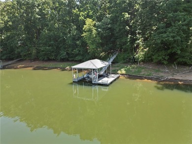 Experience exceptional lakefront living in this custom-built - photo 15