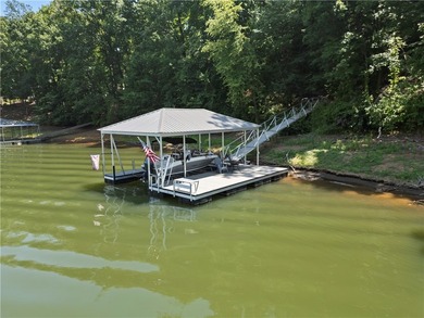 Experience exceptional lakefront living in this custom-built - photo 16