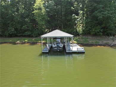 Experience exceptional lakefront living in this custom-built - photo 17