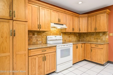 This rare single-level, Handicap accessible gem has everything: