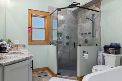 Experience exceptional lakefront living in this custom-built - photo 34
