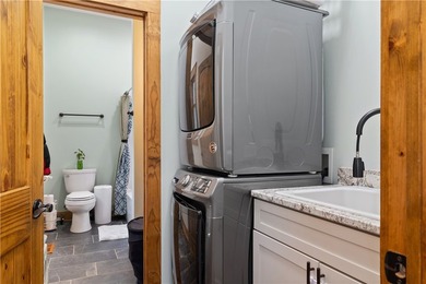 Experience exceptional lakefront living in this custom-built - photo 39