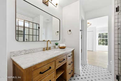Set between the sea breeze and the sunset, this fully renovated - photo 50