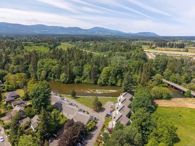 Top floor riverfront living in the heart of Courtenay! This - photo 2