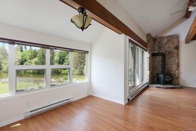 Top floor riverfront living in the heart of Courtenay! This - photo 9