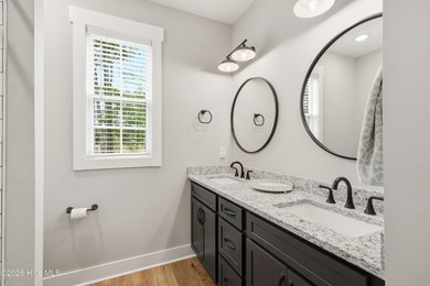 Welcome to this exceptional custom-built home in the highly - photo 22