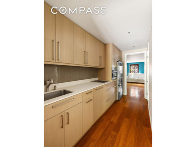 This impeccably renovated 20-foot-wide townhouse, located on one - photo 22