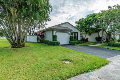 Discover this beautifully updated residence in the highly - photo 2