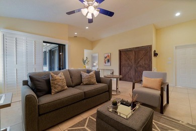 Discover this beautifully updated residence in the highly - photo 3