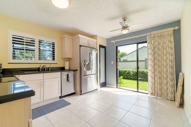 Discover this beautifully updated residence in the highly - photo 6