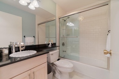 Discover this beautifully updated residence in the highly - photo 9