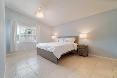 Discover this beautifully updated residence in the highly - photo 10