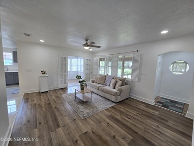 Home on half Acre lot centrally located. Features: New kitchen - photo 2