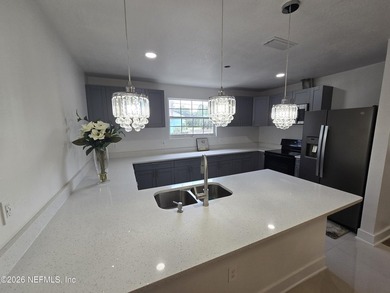 Home on half Acre lot centrally located. Features: New kitchen - photo 7