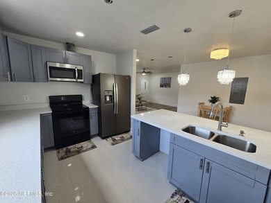 Home on half Acre lot centrally located. Features: New kitchen - photo 8