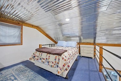 Charming 1 bed, 1 bath home with loft-style bedroom in the gated - photo 21