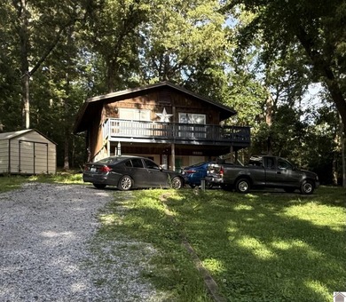 Enjoy the best of lake living at 132 Mermie Road in Hardin, KY! - photo 1