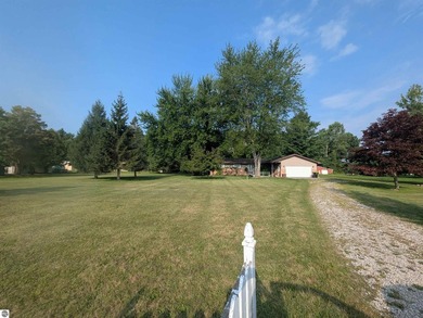 A welcoming 3 bedroom, 1 bath house on an acre just outside the - photo 3