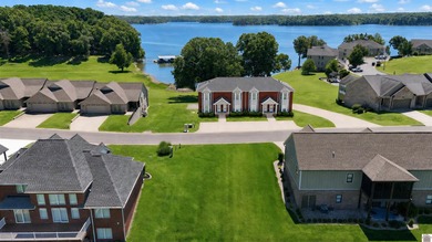 Nestled in the scenic waterfront community Moon Bay , this - photo 3