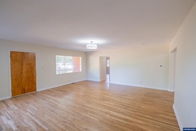 Relax on the porch & enjoy the feel of rural living right on the