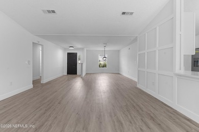 Welcome home to this beautifully renovated 4-bedroom, 2-bath - photo 11